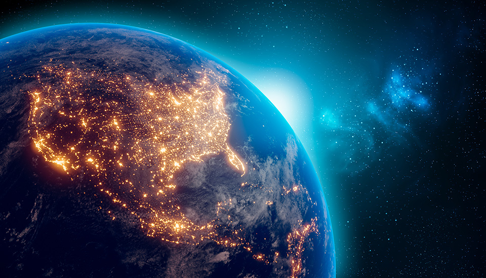 Stock image of Earth showing the United States lit at night taken from outer space