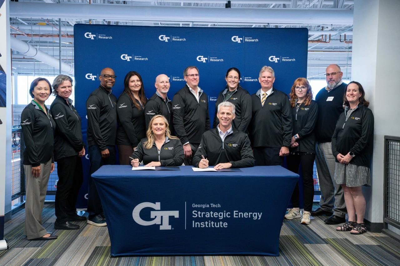 Seated, from left: Deb Gracio, PNNL Laboratory Director; Tim Lieuwen, Georgia Tech Executive Vice President for Research. Standing, from left: Yuanzhi Tang, SEI Executive Director; Alexa Harter, Director, GTRI CIPHER Lab; George White, Executive Director, GT Strategic Partnerships; Asha Menon, SEI Program Manager; Scott McWhorter, SEI Director for National Lab Partnerships; Bill Pike, PNNL Deputy Director for Science and Technology; Jess Smith, PNNL Senior Cybersecurity Researcher; Steve Biegalski, Georgia 