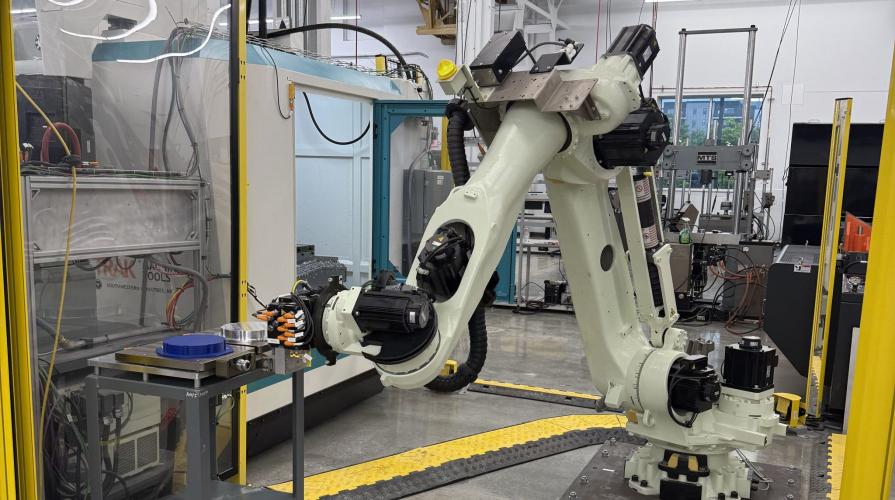  A robotic arm moves amongst AMPF facilities