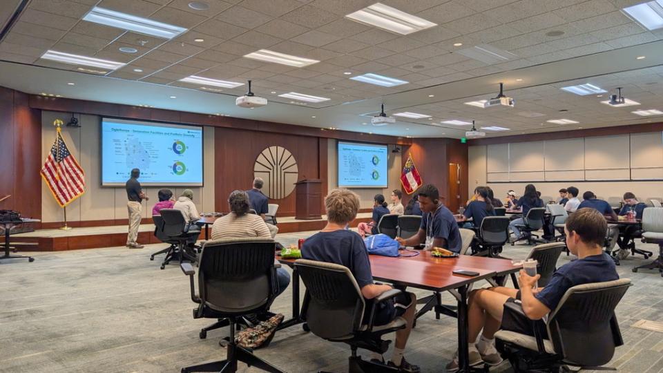 Oglethorpe Power’s George Mathai and Shane Tolbert, Green Power EMC’s distributed energy resources manager, discussing the roles of various generation sources and the benefits of a diverse portfolio 